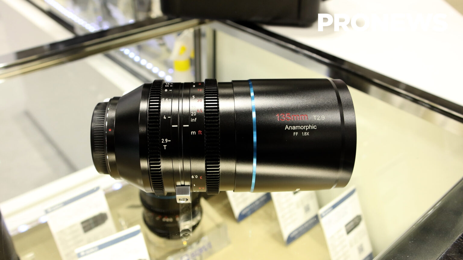 SIRUI: Exhibiting a full-frame anamorphic lens featuring a blue lens flare